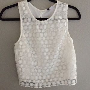 White sleeveless cropped top